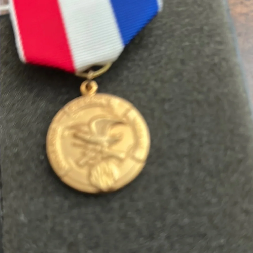 Gold Medal with Red, White, and Blue Ribbon Natinal Patriots Medal